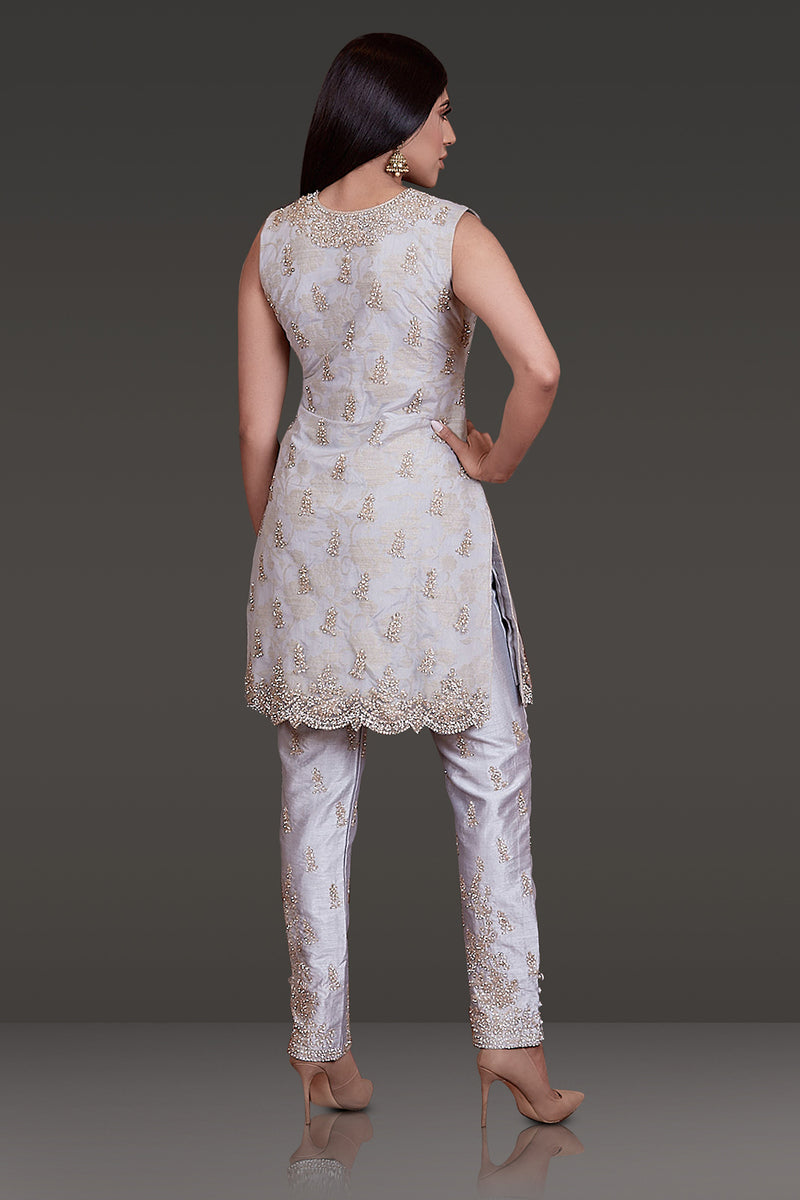 LIGHT GREY KAMEEZ WITH ZARI AND STONE WORK ALL OVER PAIRED WITH SILK PANTS AND NET DUPATTA