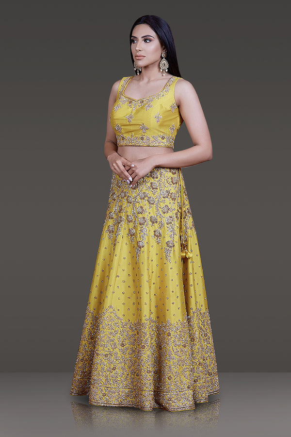 Bright Yellow Taffeta Silk Lehenga-Top-Dupatta Embossed with Ivory Gold & Stone Work