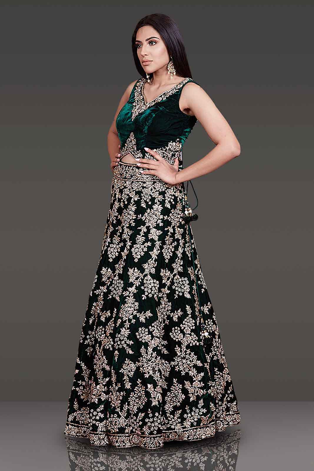 Bottle-Green Micro-Velvet Bridal Lehenga with Gold Zardozi top and Stone Embroidery