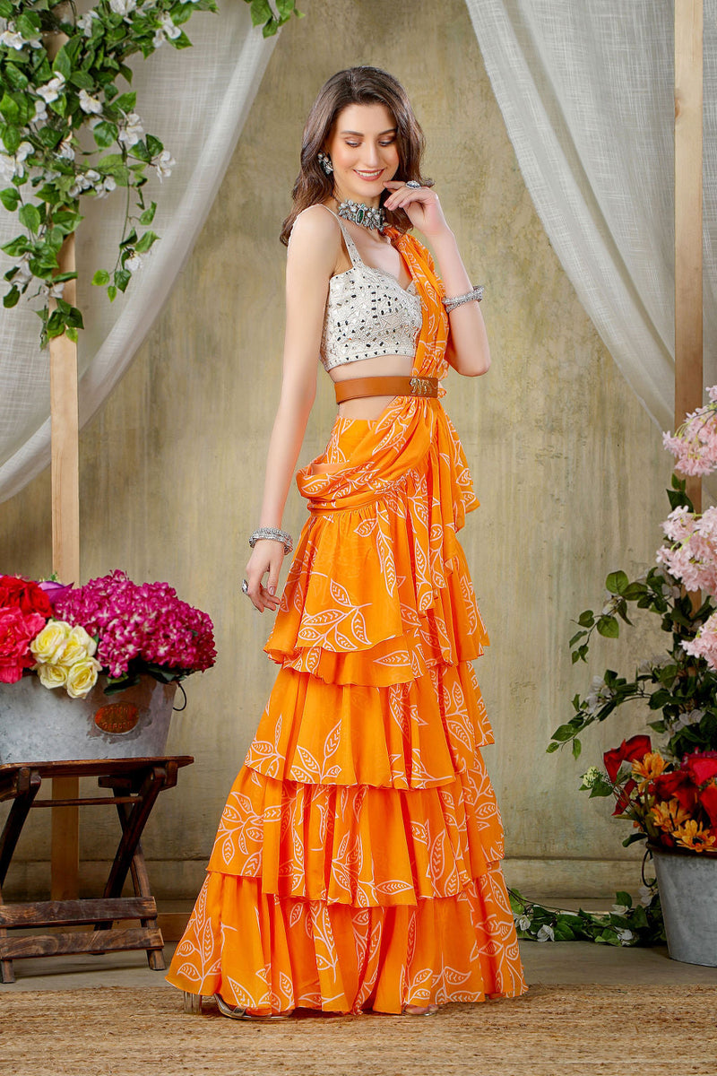 Orange Printed Ruffle Saree with mirror embroidered Blouse
