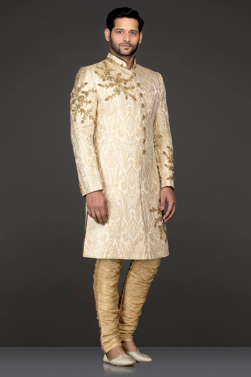 Ivory Gold Brocade Sherwani With Gold Dabka Embroidery Paired With Gold Chudidar