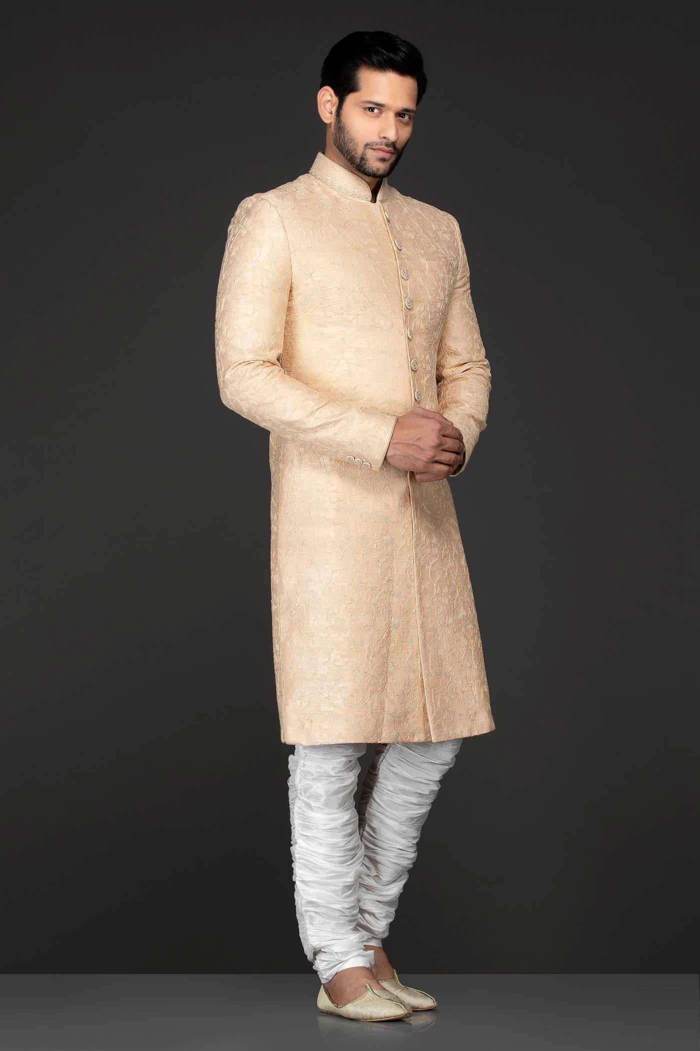 Peach Brocade Sherwani With Embroidery Buttons Paired With White Trousers