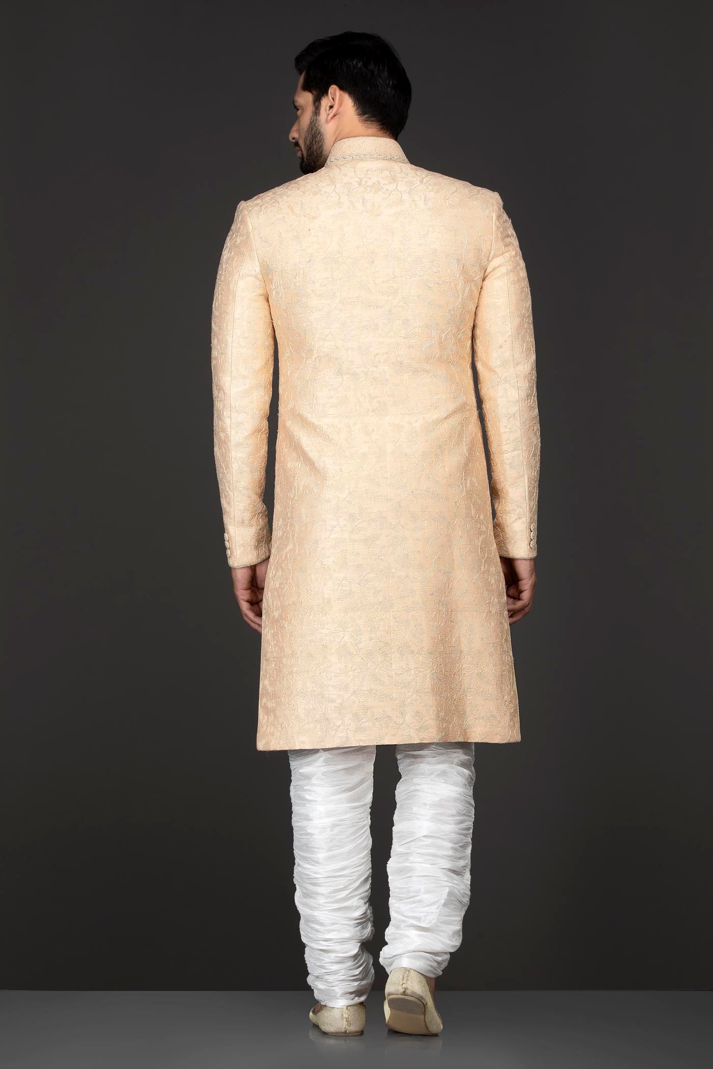 Peach Brocade Sherwani With Embroidery Buttons Paired With White Trousers