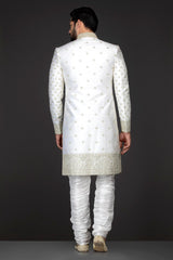 White Colour Silk Sherwani With Silver Zari Embroidery And White Silk Chudidar