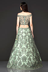 Mint Green Net Lehenga Top With Grey Thread/Resham Embroidery Highlighted With Silver Stones