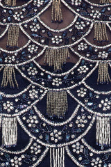 Navy Blue Georgette Skirt And Net Grey Tassel Top With Net Dupatta