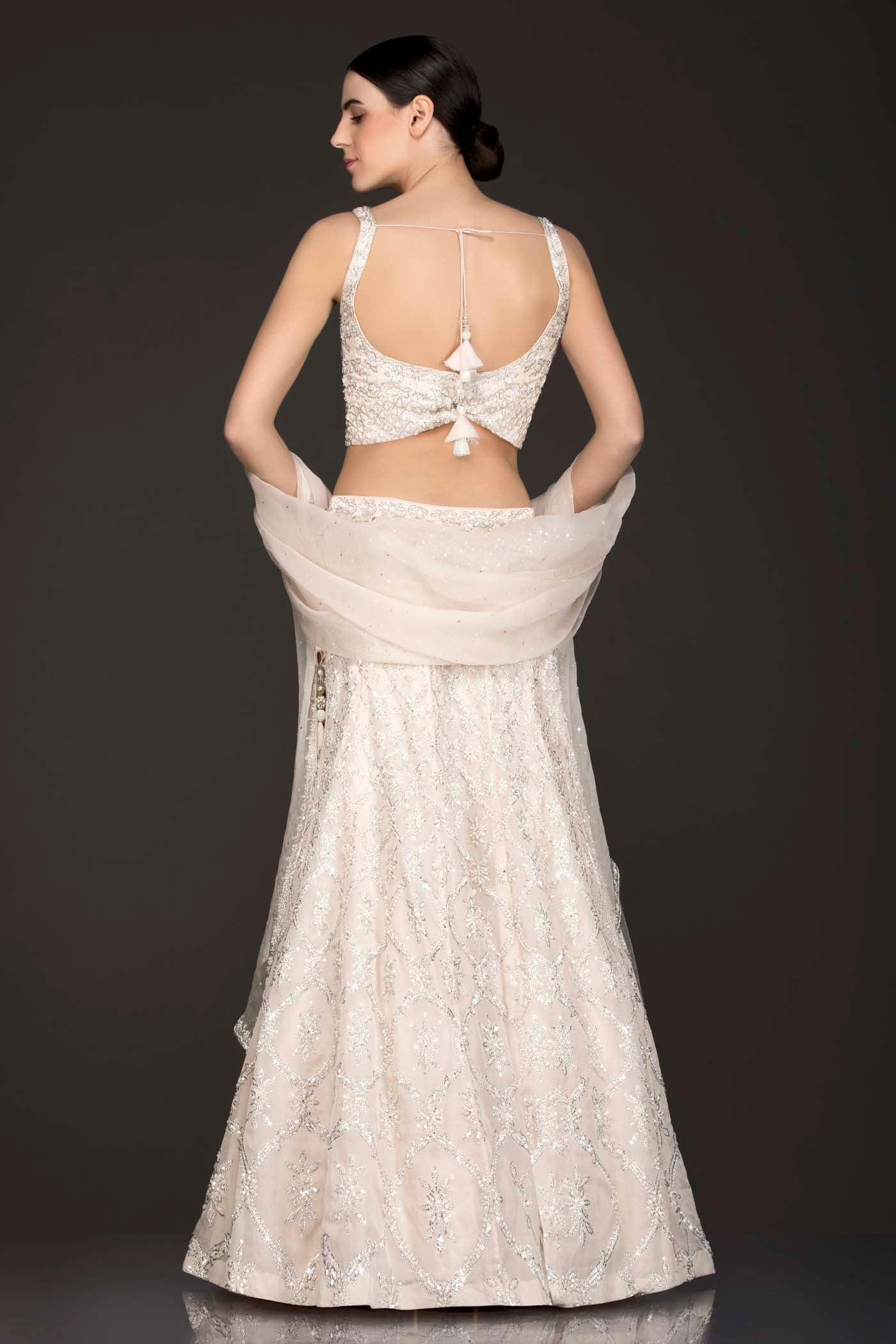 Ivory Colour Organza Lehenga Top With Silver Work And Net Dupatta