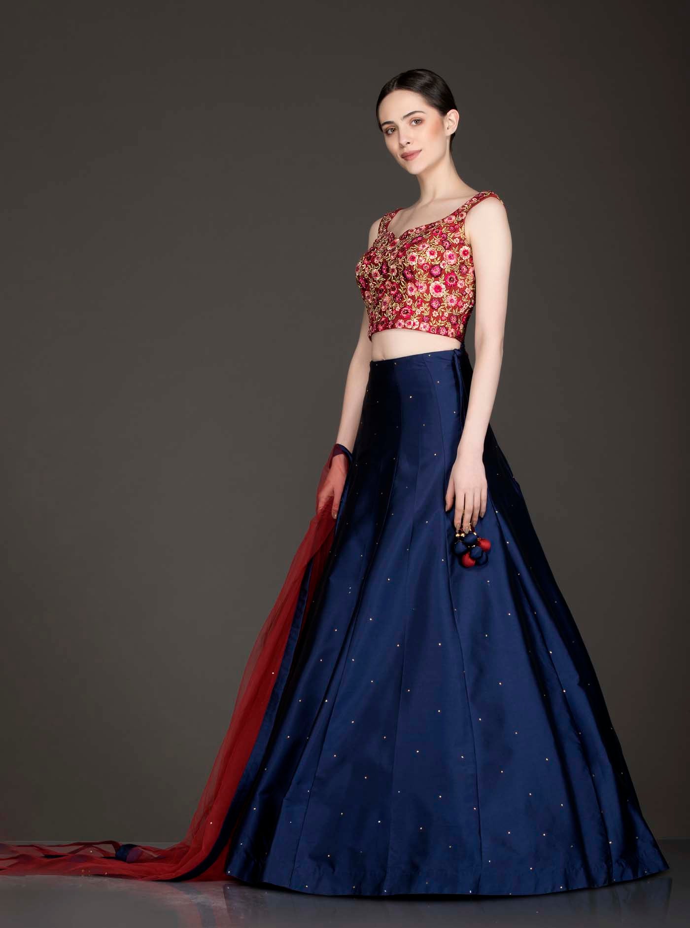 Maroon Silk Thread Work And Zari Embroidery Top With Royal Blue Silk Skirt And Maroon Net Dupatta