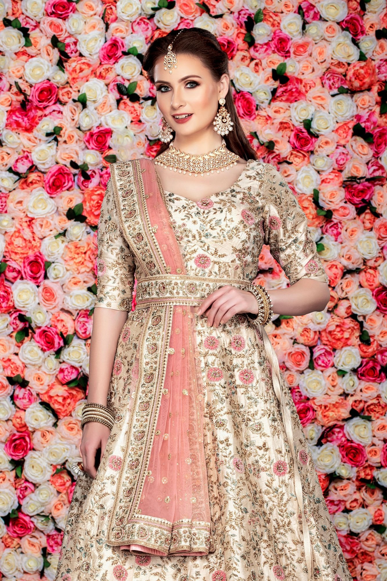 Ivory bridal lehenga with Contrast Peach Dupatta
